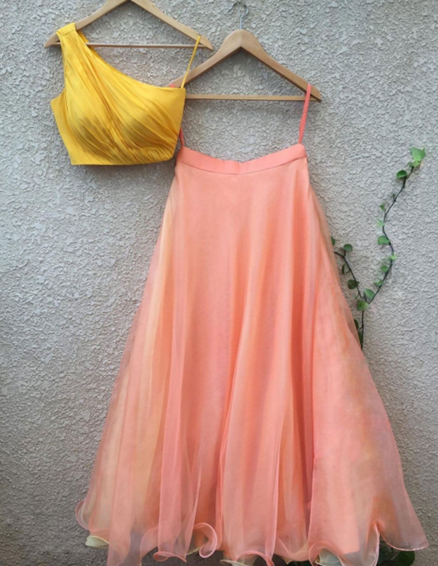Peach lehenga with yellow blouse in organza fabric